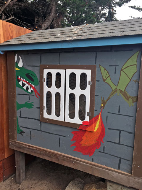 Dragon mural on the chicken coop is amusing